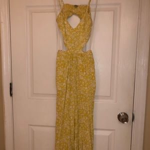 Summertime yellow romper with flare bottoms